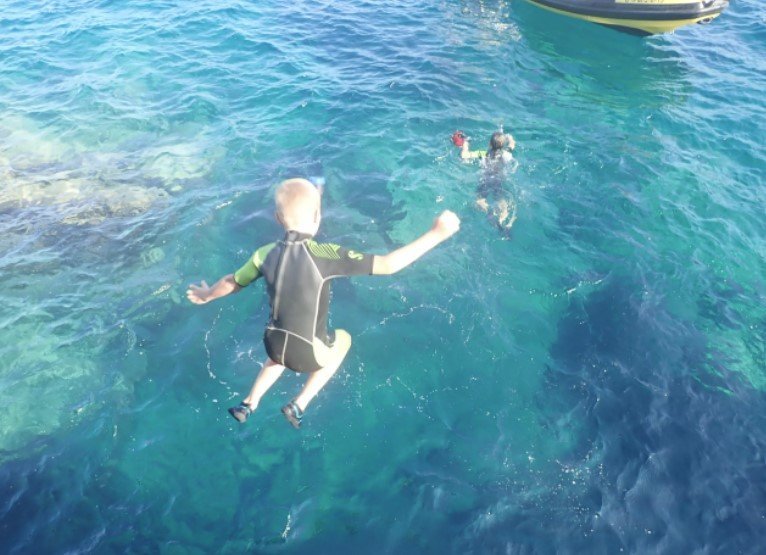 jumping into the water