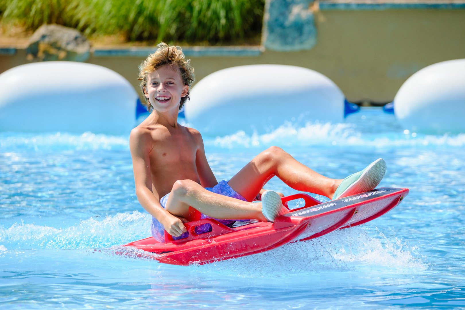 kid enjoying the pool
